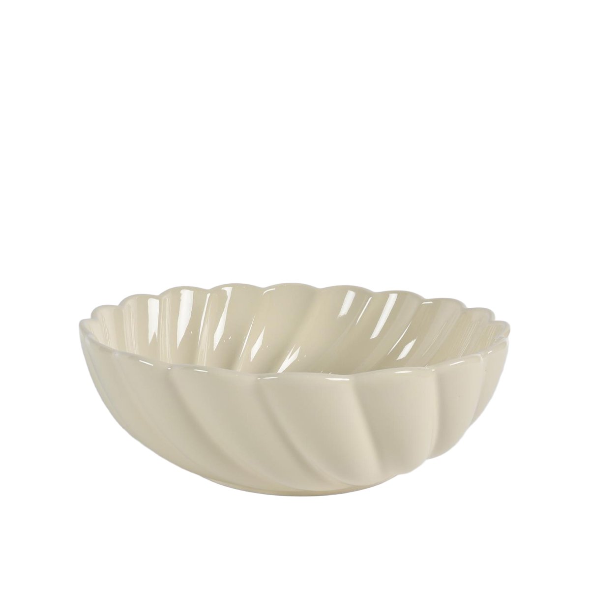 Beige ceramic bowl with scalloped edge on a white background