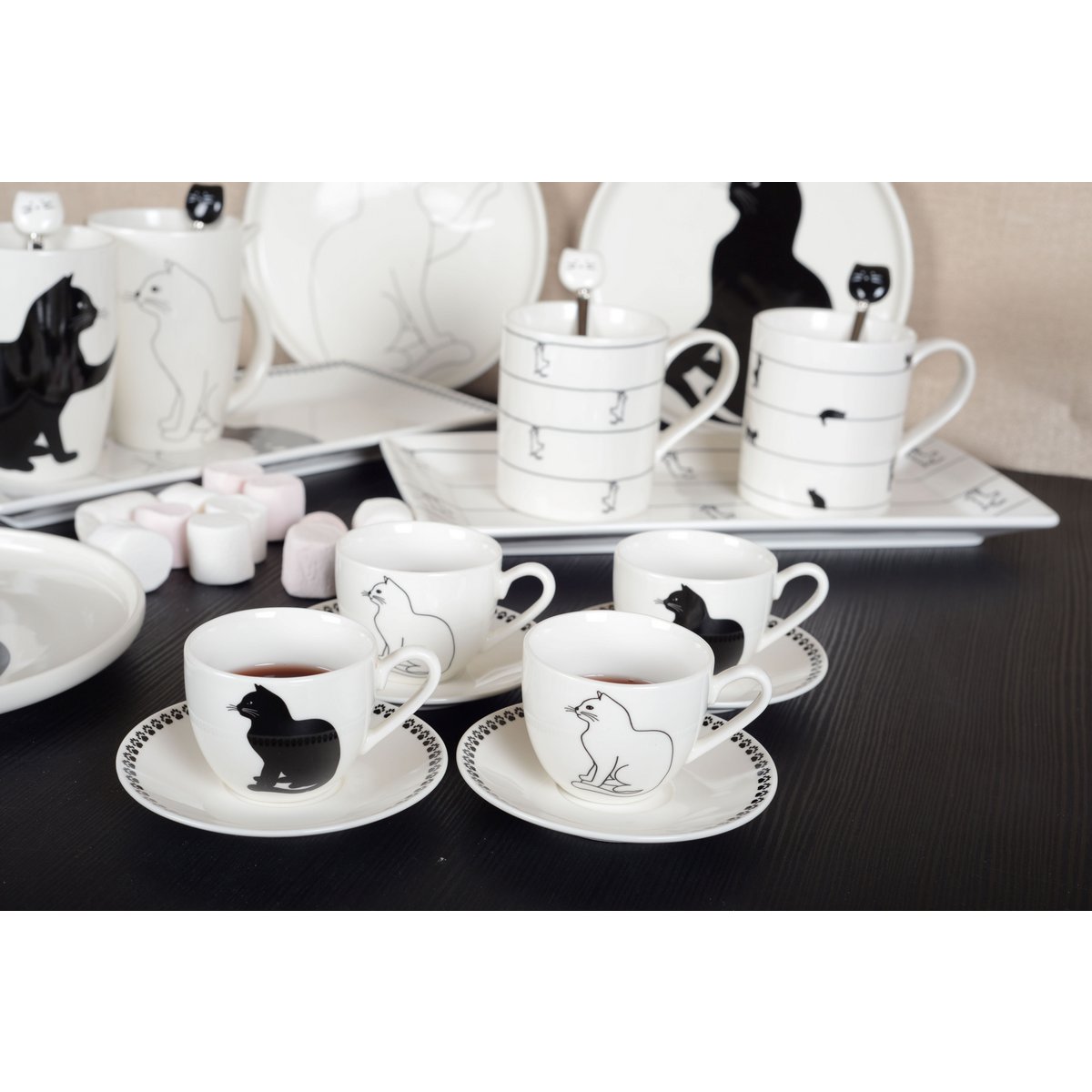 Black and white ceramic cat coffee cup set with saucers, perfect for kitchen decor | CozyVibe


