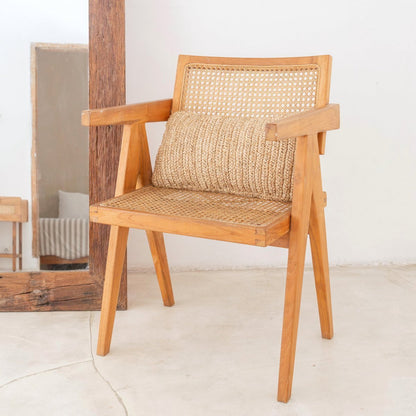 CozyVibe DALUNG decorative raffia cushion styled on a sofa
