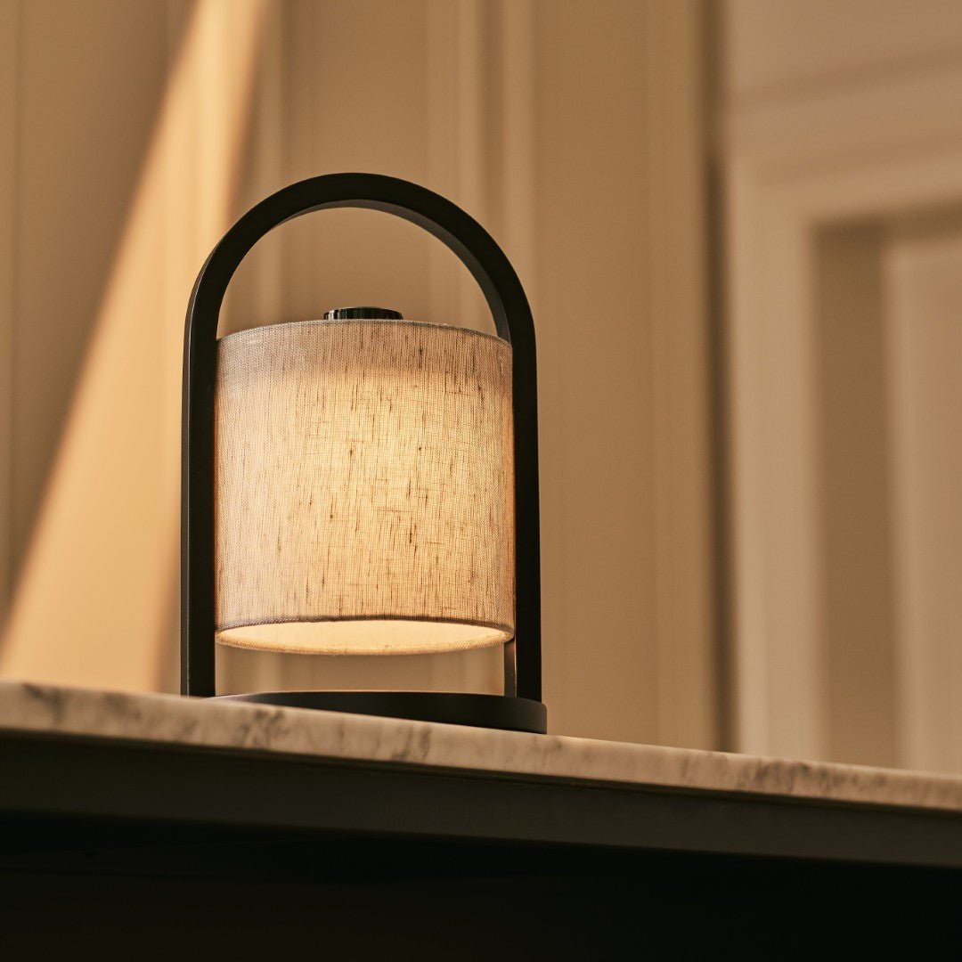 Portable dimmable lamp in black and grey with rechargeable battery