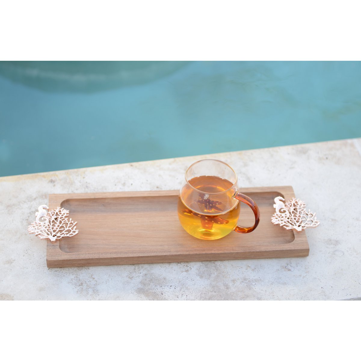 Elegant glass tea cup set with gold star and shell accents, perfect for kitchen decor | CozyVibe