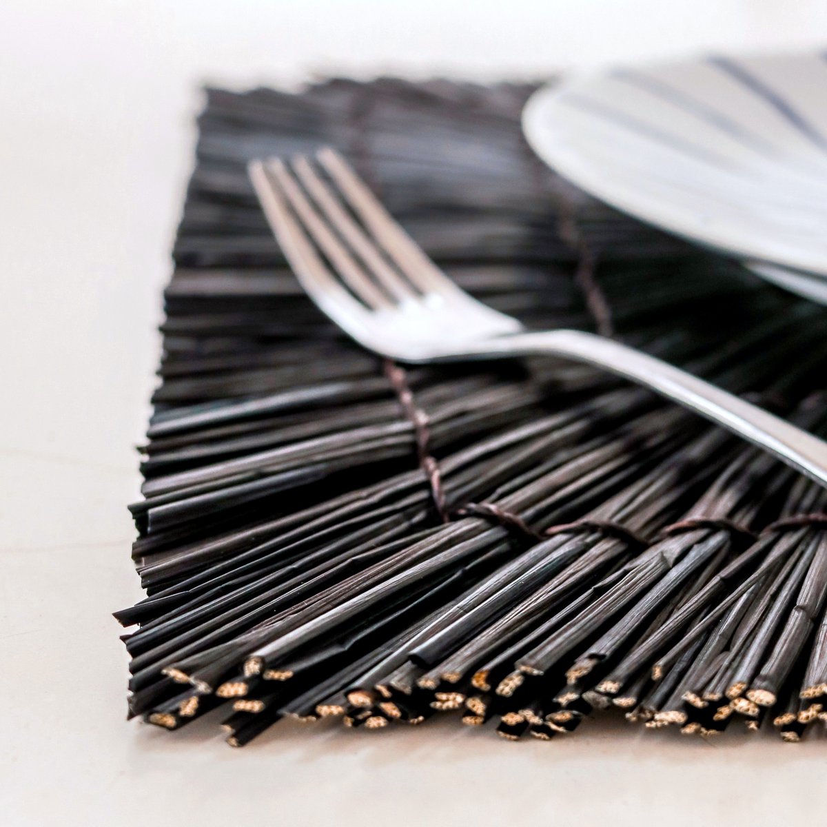 Handwoven black seagrass placemat for cozy home décor by CozyVibe

